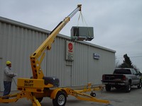 Biljax 3632t trailer mounted telecoping boom lift is a handy crane