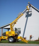 Bil-jax 3632t trailer mounted telecoping boom lift is great for building maintenance