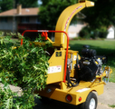 The 6" Brush Chipper inhales branches and spits them out